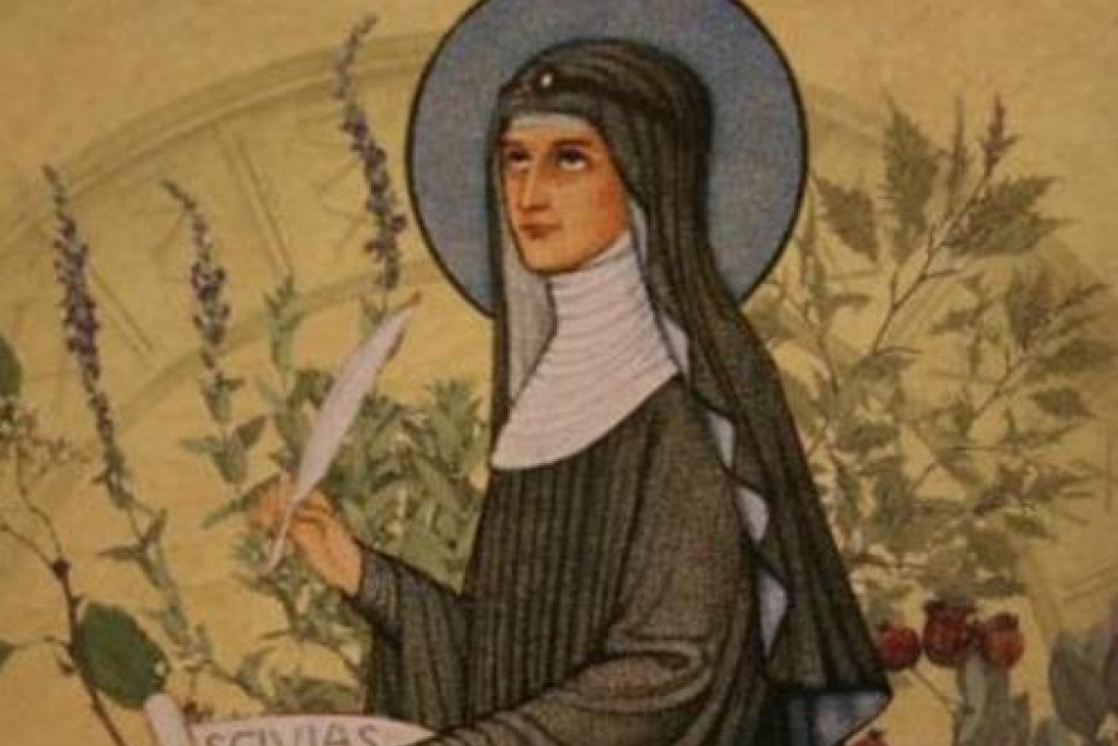 Prent van Hildegard van Bingen. Ze schrijft een brief.