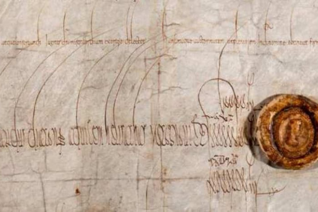 Detail met het zegel en de handtekening van keizer Lodewijk de Vrome op de oorkonde uit 819 over de rechten van de Sint-Baafsabdij in Gent