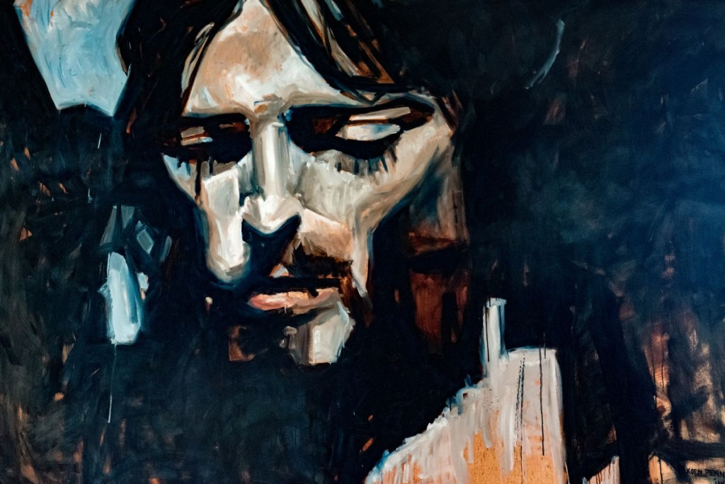 Dit schilderij van Koen Penninck met diepblauwe kleuren toont het gelaat van Christus, de ogen gesloten.
